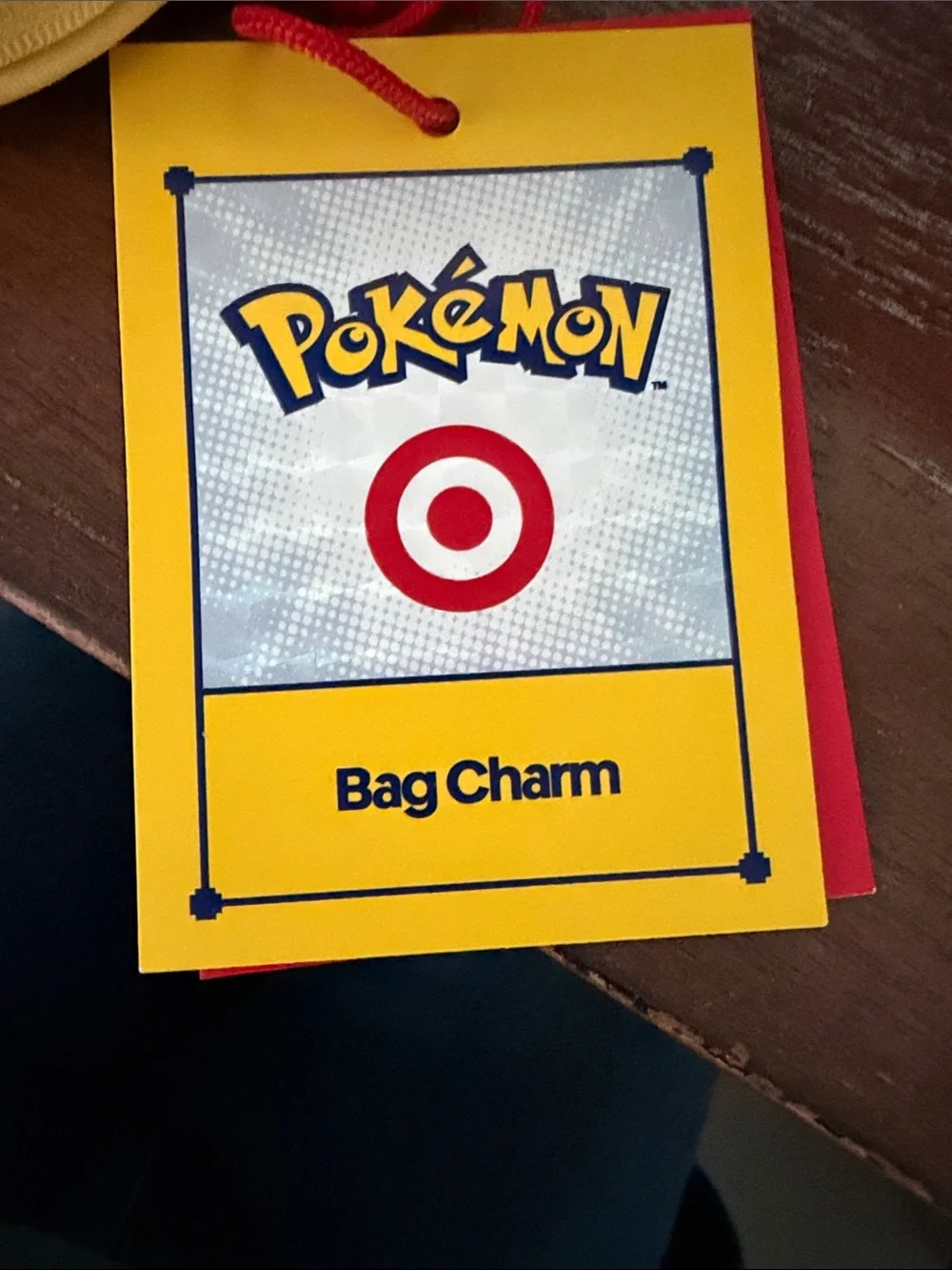 Pokemon x Target pokeball Yellow bag charm with Red Cord NWT rare collectible